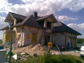 Kompleksowa budowa domów mieszkalnych oraz budynków gospodarczych - Koparko ładowarka Lędyczek