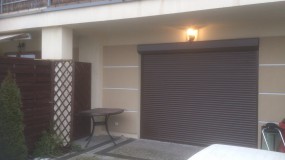 bramy garażowe - ALUMROL rolety Marki