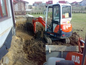 Koparka, minikoparka, ładowarka - prace przy fundamentach - Zakład Zmechanizowanych Robót Ziemnych i Transportowych Henryk Woźniak Głogów