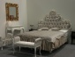 Łóżko z tapicerowanym zagłówkiem Radomsko - GREEN VALLEY